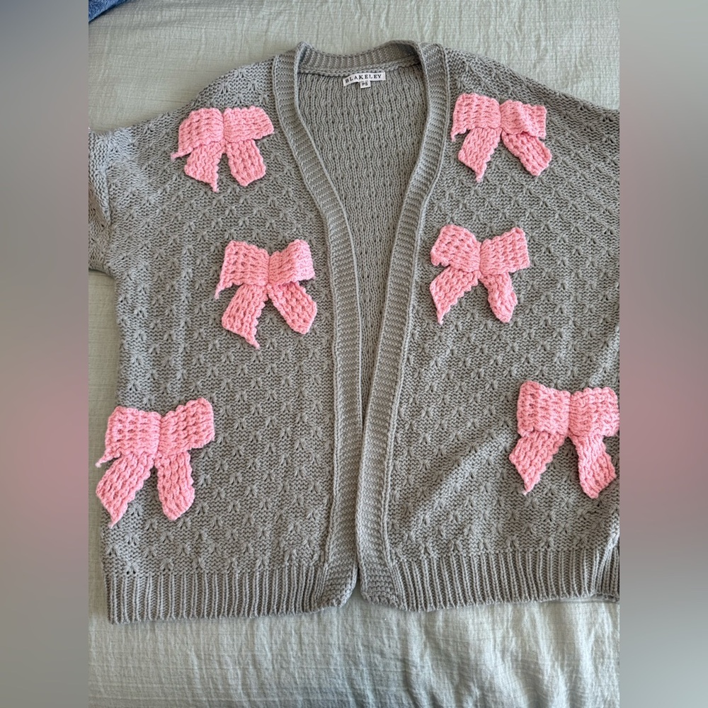 Boutique Sweater with Pink Bow Accents
